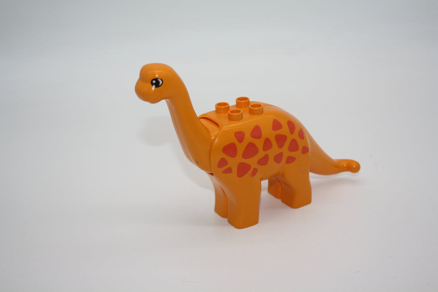 Duplo - gr. Langhals (Brachiosaurus) - bew. Kopf - orange/rot - Dinosaurier - Dino