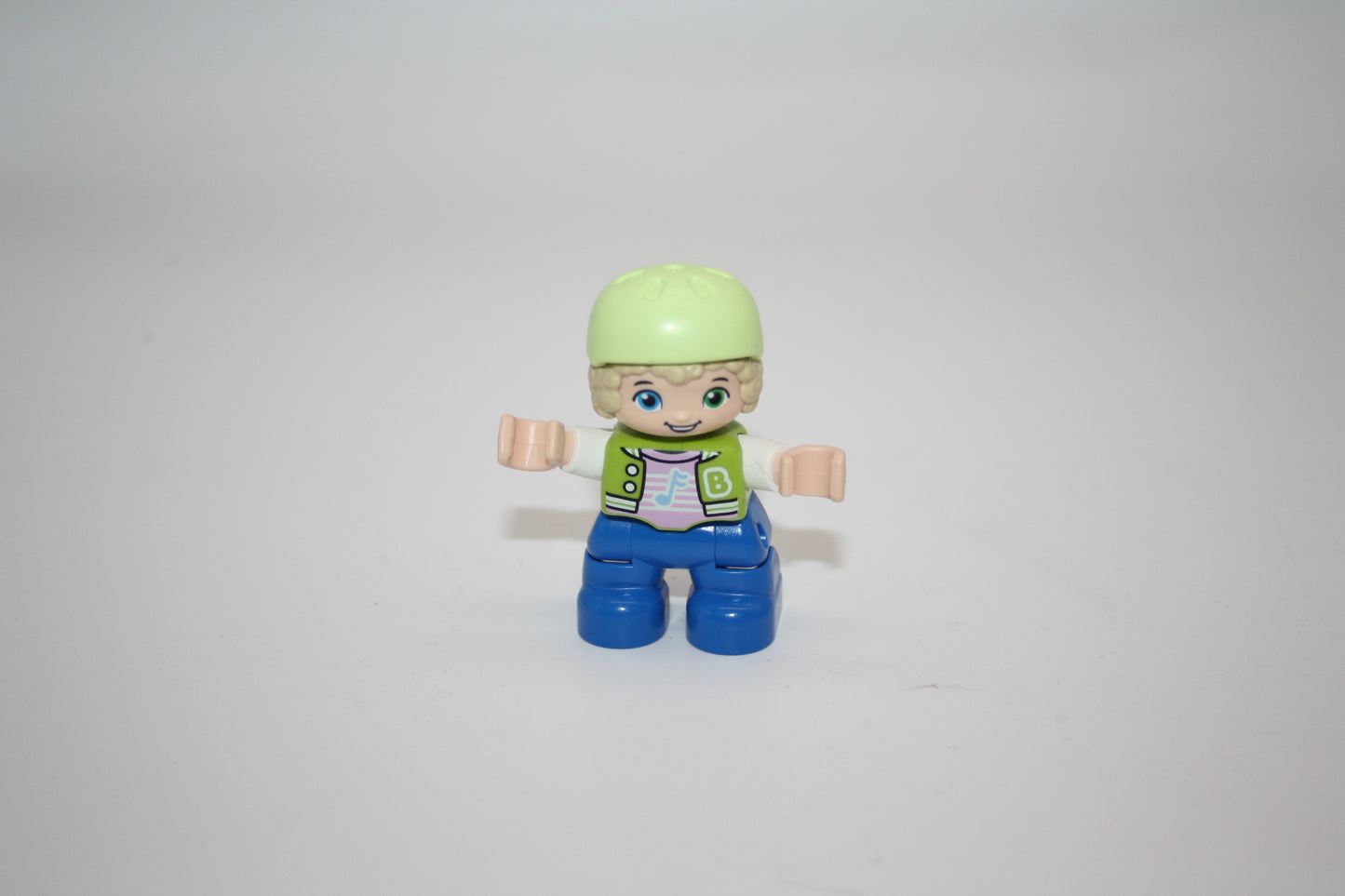 Duplo - Junge - blaue Hose/grüne Jacke/ Skaterhelm/Fahrradhelm - Figur