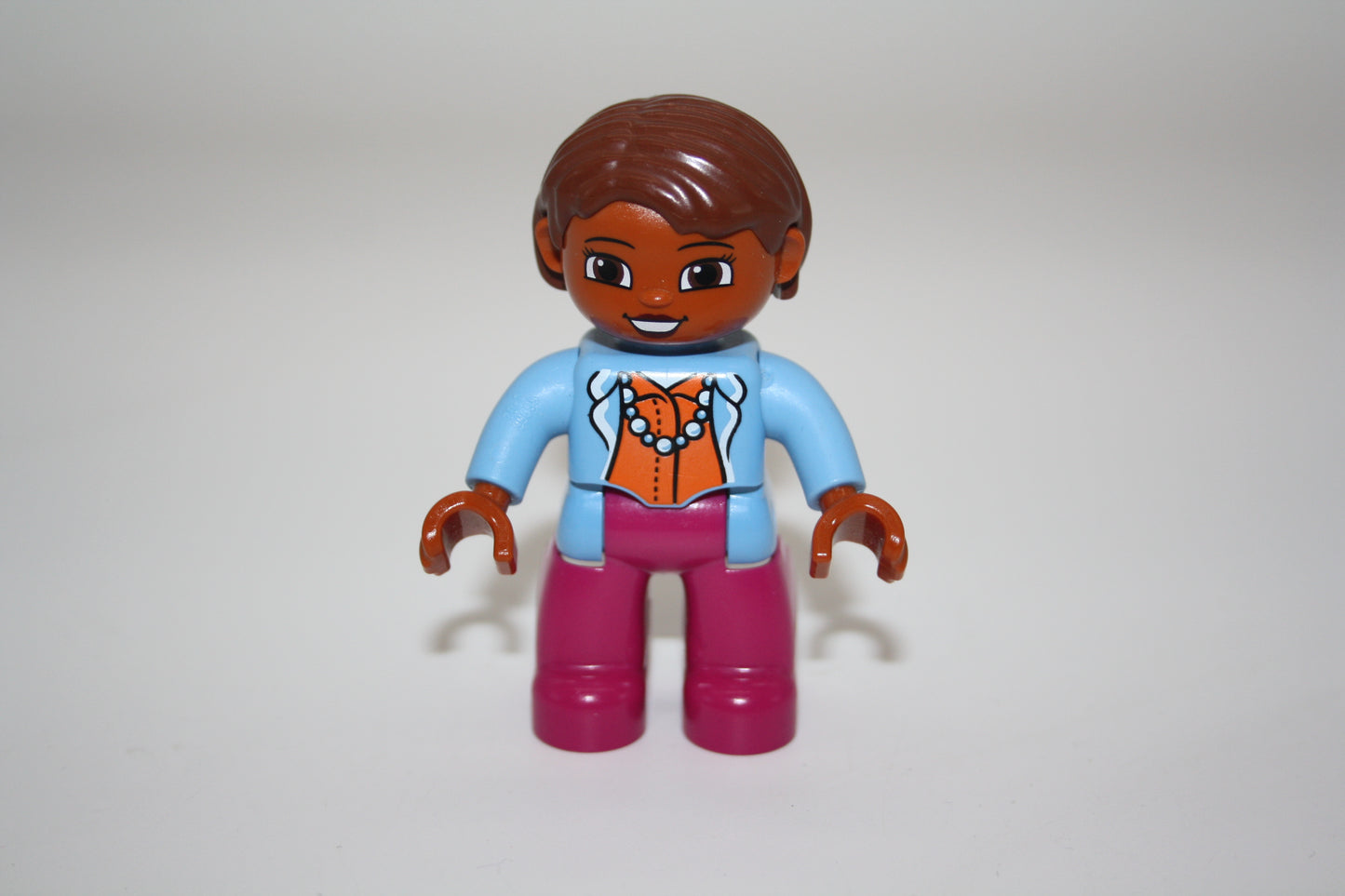 Duplo - Frau - braune Haare- pinke Hose - hellblaue Jacke - Kelly - Figur
