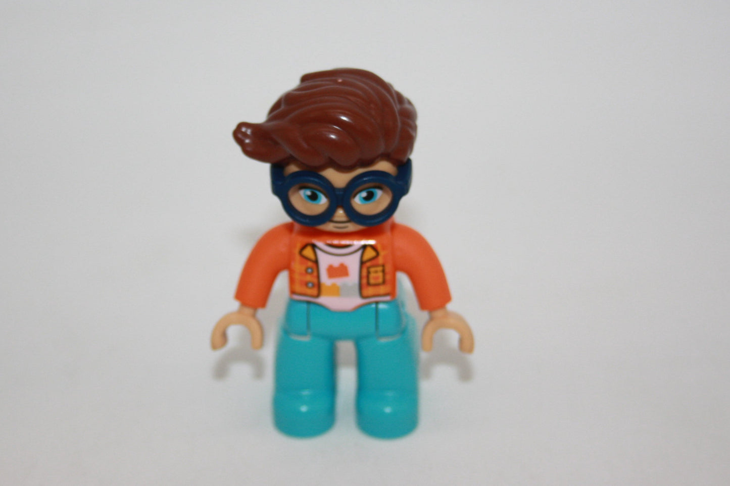 Duplo - Mann mit Brille - orangene Jacke - Lego Steine auf Oberteil - neu/unbespielt
