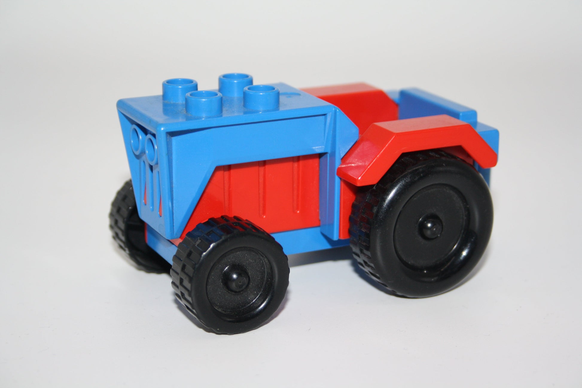 Duplo - kl. Traktoren/Trecker - versch. Farben - Bauernhof - Fahrzeuge - blau-rot - Fahrzeuge