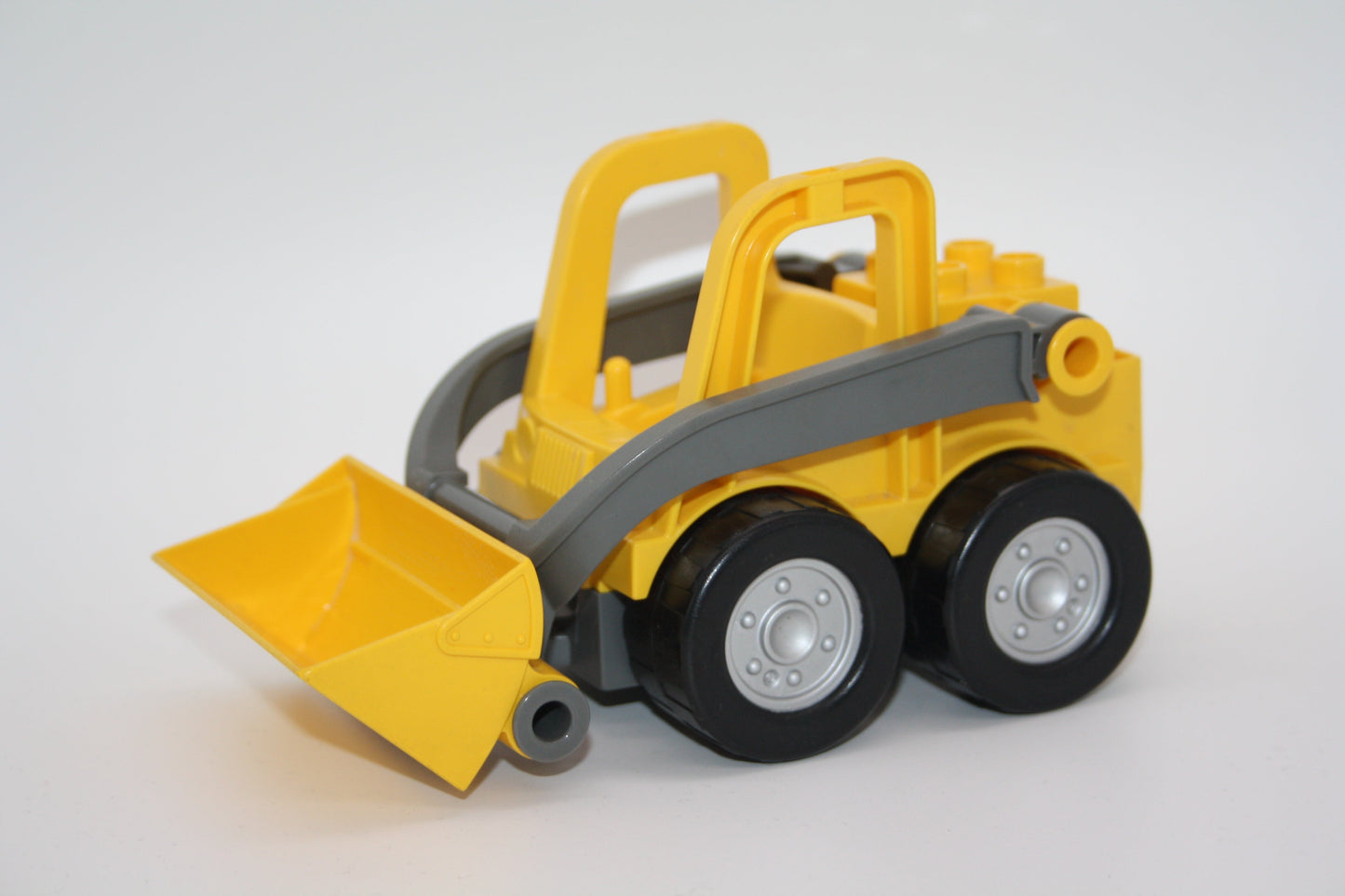 Duplo - Kompaktlader/Bagger - versch. Farben - Bauernhof/Baustelle - Fahrzeuge - gelb - Fahrzeuge