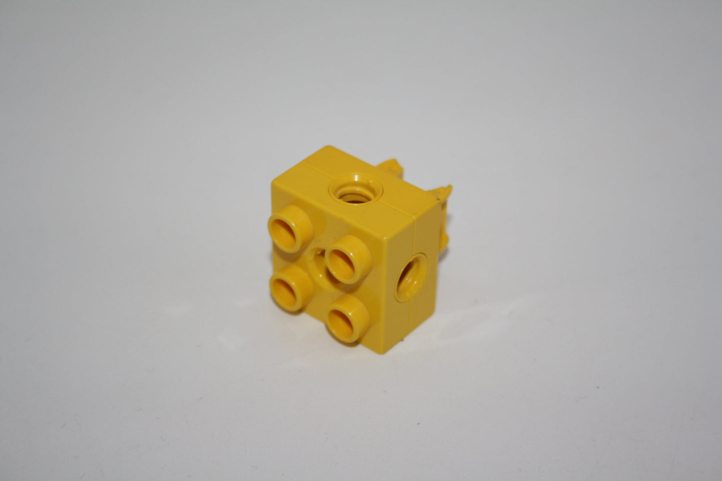 Duplo Toolo - 2x2 Stein mit Clip unterm Stein - 74957c01 - gelb - Ersatzteil - Ersatzteil/Einzelteil