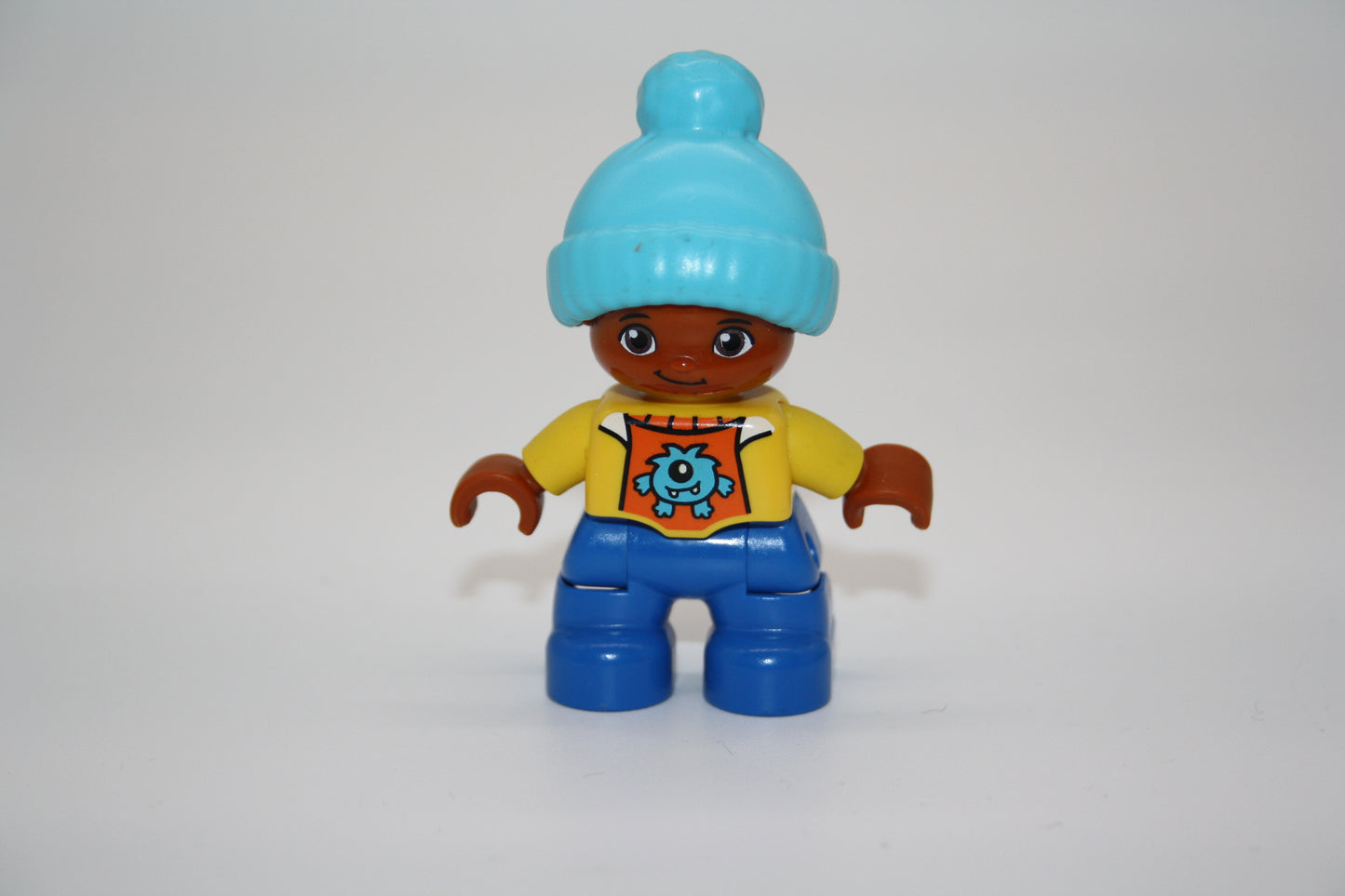 Duplo - Junge - Wollmütze - blaue Hose/gelbe Jacke m. Monster - Figur