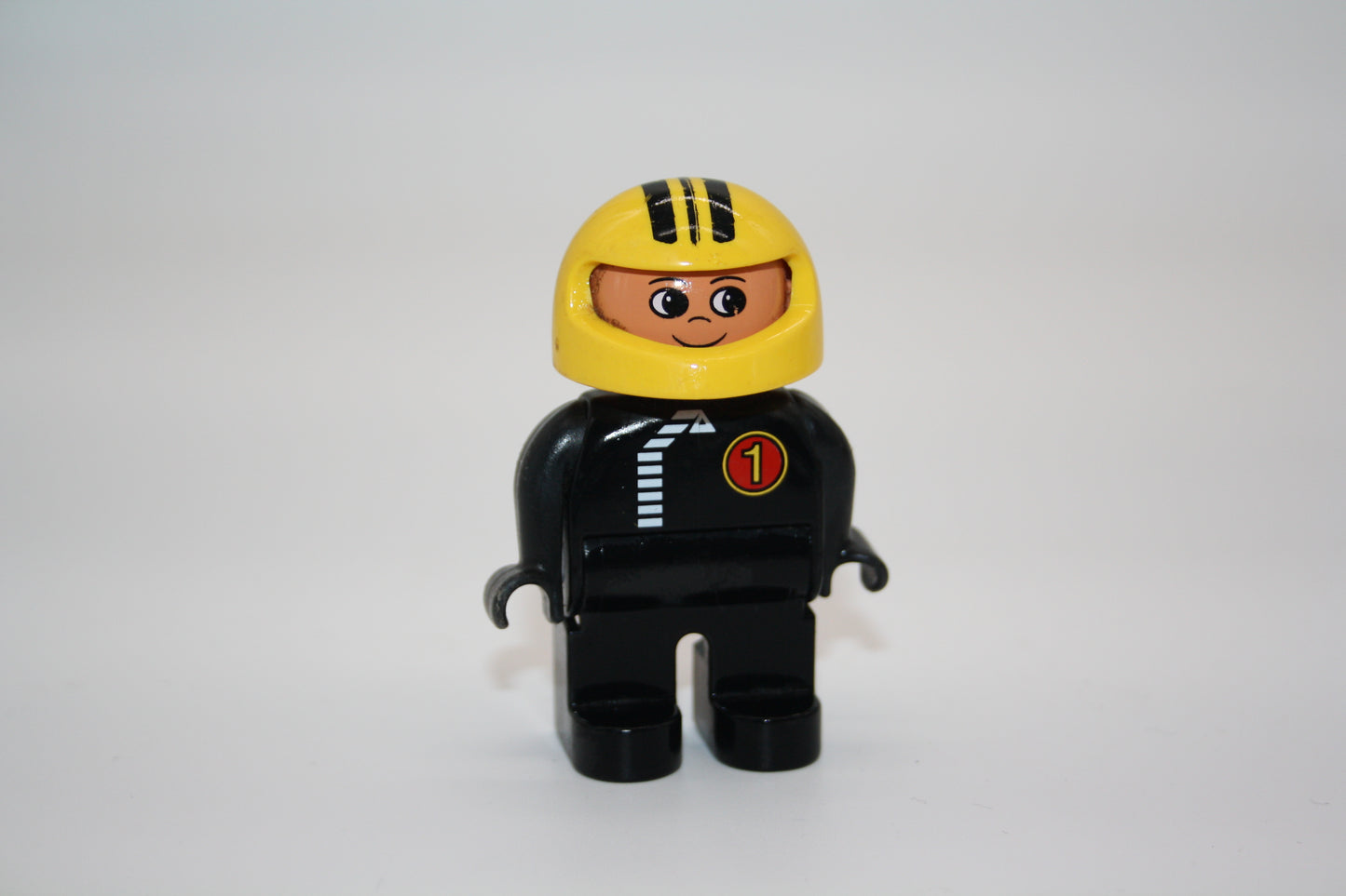 Duplo - Rennfahrer/Motorradfahrer alt - schwarzer Anzug/gelber Helm - Mann - Figur