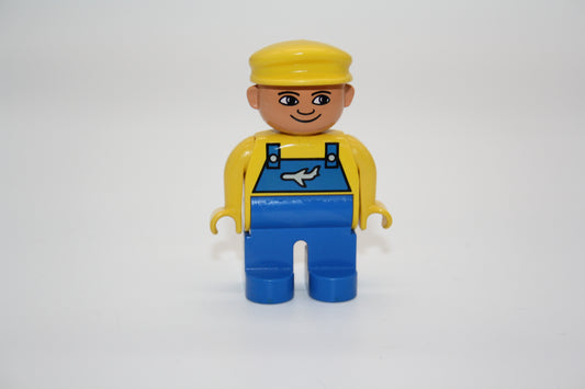 Duplo - Pilot - blaue Latzhose m. Flugzeug/gelbes Oberteil  - Mann - Figur