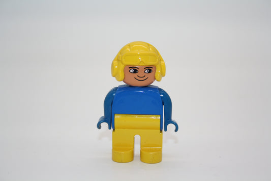 Duplo - Pilot/Rennfahrer alt - gelbe Hose/blaues Oberteil/gelber Helm  - Mann - Figur