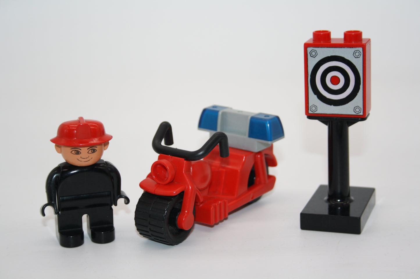 Duplo - Feuerwehrmann mit altem Motorrad und Zubehör