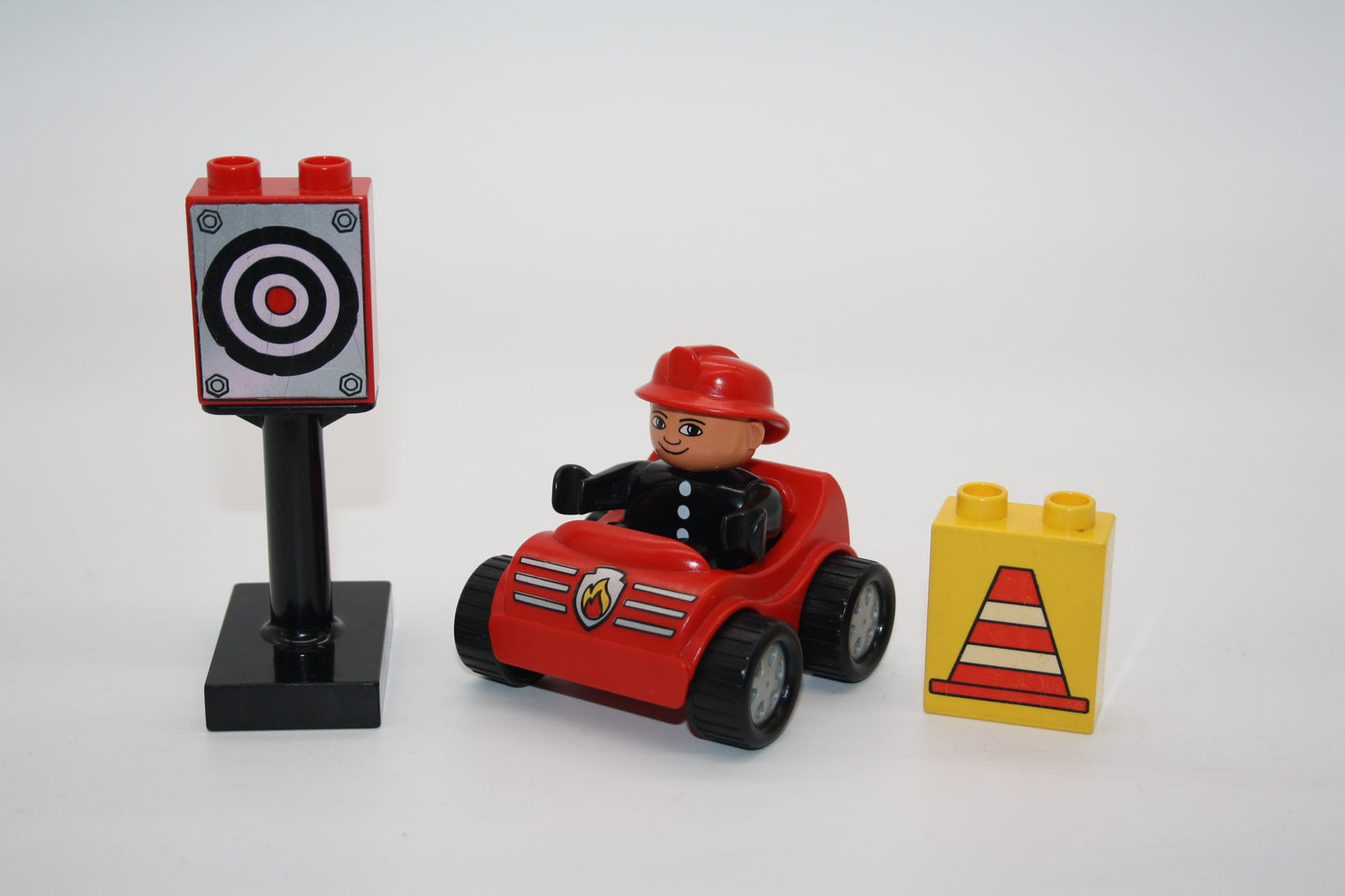 Duplo - Feuerwehrmann mit altem Miniflitzer und Zubehör