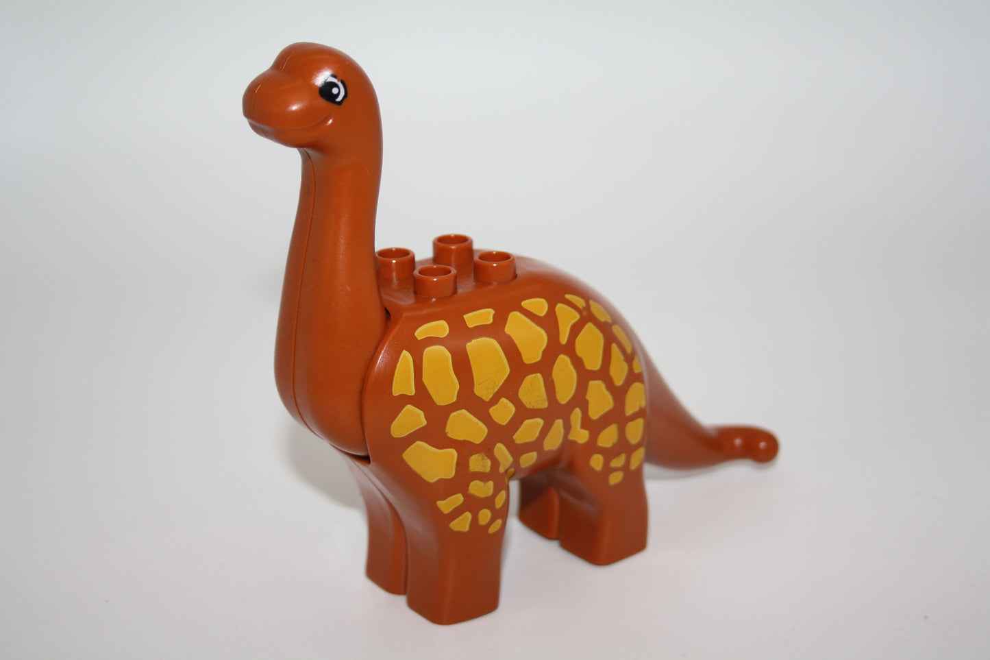 Duplo - gr. Langhals (Brachiosaurus) - bew. Kopf - braun/gelb - Dinosaurier - Dino